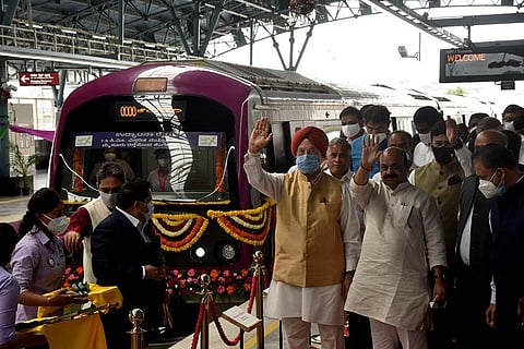 Union Minister Hardeep Singh Puri and Karnataka CM Basavaraj Bommai flagging off the first train on the Mysuru Road-Kengeri Lne from Nayandahalli Metro station. (Photo| Nagaraj Gadekal, EPS)