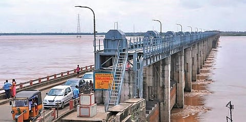 Godavari flood water at Dowleswaram Barrage in East Godavari district. (Representational image | EPS)