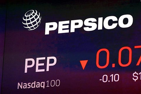 FILE - The symbol for Pepsico appears on a screen at the Nasdaq MarketSite in New York. (Photo | AP)