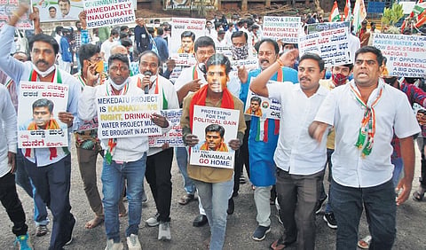 Youth Congress workers protest against Tamil Nadu BJP president K Annamalai for his opposition to the Mekedatu balancing reservoir-cum-drinking water project in Bengaluru on Thursday | express