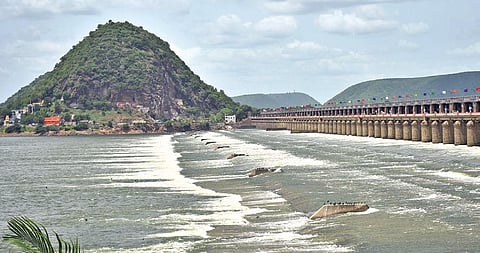 Following heavy inflows from upstream, floodwater being released downstream from Prakasam Barrage in Vijayawada on Thursday I Prasant Madugula