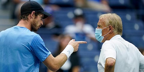 Andy Murray complains to an official between sets against Stefanos Tsitsipas, of Greece, during the first round of the US Open tennis championships in New York. (Photo | AP)