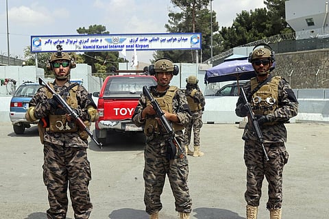 Taliban special forces fighters stand guard outside the Hamid Karzai International Airport after the U.S. military's withdrawal, in Kabul, Afghanistan, Tuesday, Aug. 31, 2021. (Photo | AP)