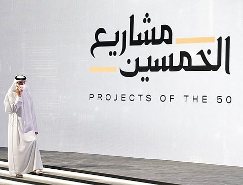 Emirati Minister of State for Foreign Trade Thani bin Ahmed al-Zeyoudi speaks on his mobile phone before an event. (Photo | AP)