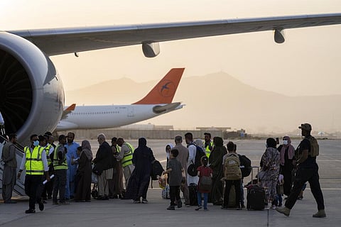 Foreigners board a Qatar Airways aircraft at the airport in Kabul, Afghanistan, Thursday, Sept. 9, 2021. (Photo | AP)