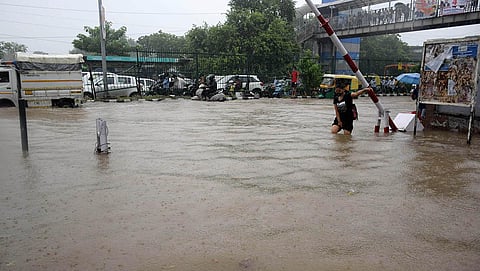 A woman outside the Saket Metro station. (Photo | Shekhar Yadav)