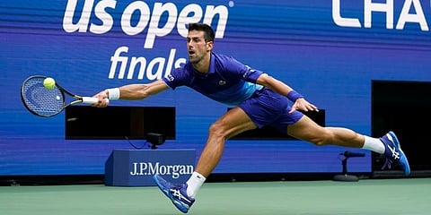 Novak Djokovic returns a shot to Daniil Medvedev during the men's singles final of the US Open tennis championships in New York. (Photo | AP)