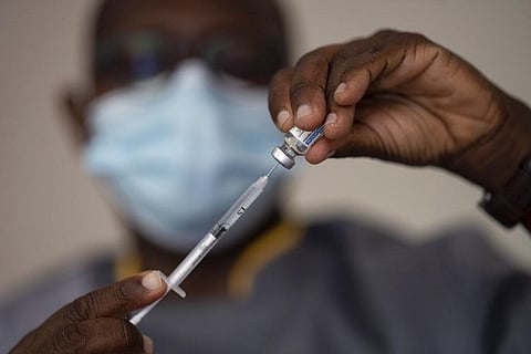 A health worker administers a dose of Janssen COVID-19 vaccine by Johnson & Johnson in the Medina neighborhood in Dakar, Senegal. (Photo | AP)