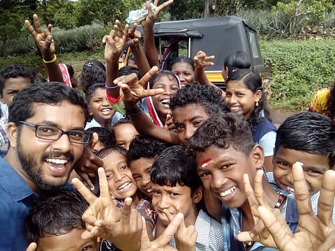 Dr KP Nitheesh Kumar with tribal students.