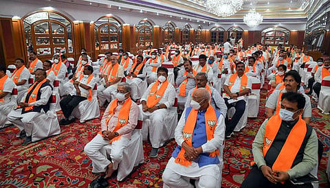 BJP legislators take part in the legislature party meeting in Bengaluru on Monday. (Photo | Express)