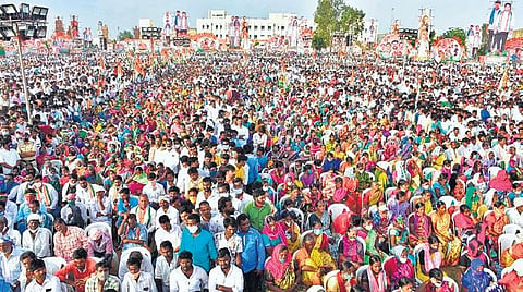 TPCC president A Revanth Reddy waves to the crowd during Dalit Girijana Dandora meeting in Gajwel on Friday