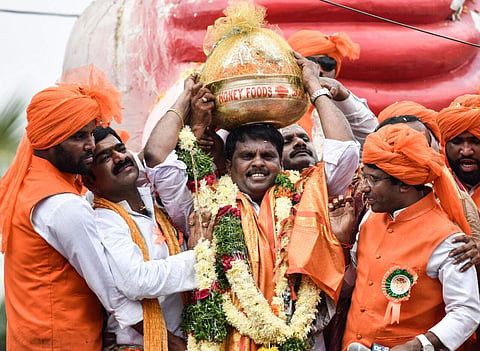 In this file photo from 2017, Nagam Tirupati Reddy bags Balapur Laddu at Rs 15.60 lakh during Ganesh Laddu Auction in Hyderabad. (File Photo | Vinay Madapu, EPS)