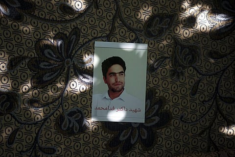 A portrait of Fida Mohammad, a 24-year-old dentist, who died after falling from a departing U.S. Air Force C-17 on Aug. 16. (Photo | AP)