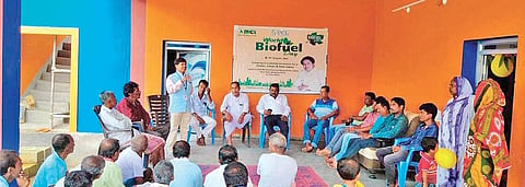Uttam educating villagers on his proposed biofuel plant and napier grass cultivation | Express