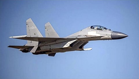 In this undated file photo released by the Taiwan Ministry of Defense, a Chinese PLA J-16 fighter jet flies in an undisclosed location. (Photo | AP)
