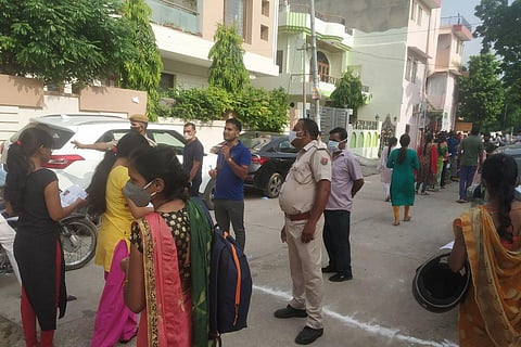 Candidates undergoing security check before entering exam centre in Jaipur. (Photo | Express)