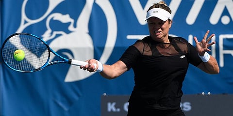 Kim Clijsters hits a forehand against Su-Wei Hsieh during her first round match in the Chicago Fall Tennis Classic tournament in Chicago. (Photo | AP)
