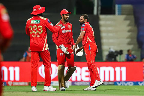 Mohammad Shami of Punjab Kings celebrates the wicket of Quinton de Kock of Mumbai Indians during the Indian Premier League match between Mumbai Indians and Punjab Kings. (Photo | PTI)