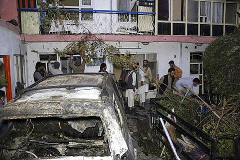 Afghans inspect damage of Ahmadi family house after U.S. drone strike in Kabul, Afghanistan. (Photo | AP)