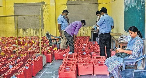 Polling officials with EVMs during the Rajasthan Panchayat Election result day in Jaipur on Saturday | PTI 