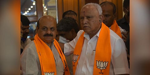 CM Basavaraj Bommai (L) with his predecessor B S Yediyurappa (R) (File Photo| Vinod Kumar T, EPS)