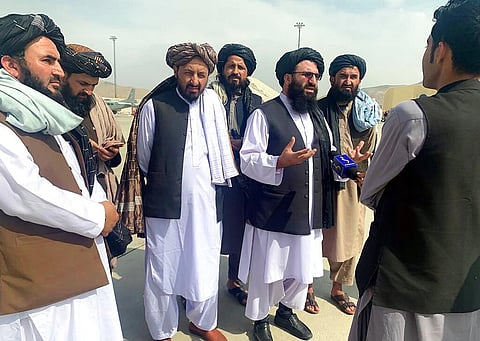 FILE | Taliban officials are interviewed by journalists inside the Hamid Karzai International Airport after the U.S. withdrawal in Kabul. (Photo | AP)