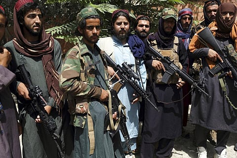 Taliban fighters pose for photograph in Wazir Akbar Khan in the city of Kabul, Afghanistan. (Photo | AP)