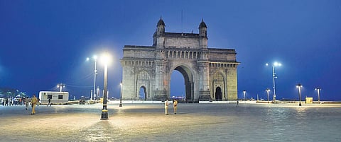 Gateway of India in Mumbai wears a deserted look on Friday following fresh restrictions imposed due to rising Covid cases  | Pti