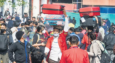 Crowd of passengers at New Delhi Railway Station amid Covid-19 even as cases increase. (Photo | PTI)