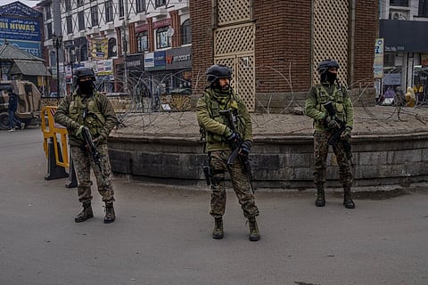 Indian paramilitary soldiers stand guard during a surprise check operation in Srinagar. (Photo | AP)