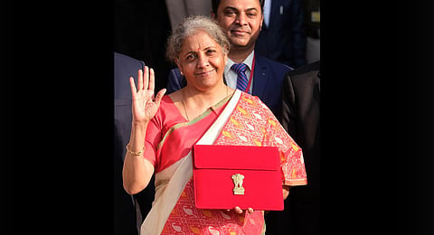 Finance Minister Nirmala Sitharaman holds a folder case containing the Union Budget 2021-22 in Delhi. (File Photo | Shekhar Yadav, EPS)