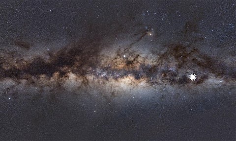 This image shows the Milky Way as viewed from Earth. The star icon shows the position of the mysterious repeating transient. Credit: Dr Natasha Hurley-Walker  (ICRAR/Curtin).