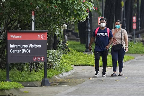 Tourists walk inside Fort Santiago at the walled-city of Intramuros in Manila, Philippines as some tourist spots reopen to the public with health restrictions. (File Photo | AP)