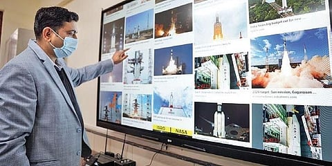 An instructor with a smart board. (Photo | EPS)
