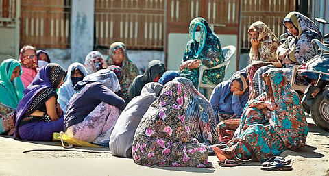 Relatives mourn the deaths of Jagdish Patel and his family at Dingucha village (Photo | PTI)
