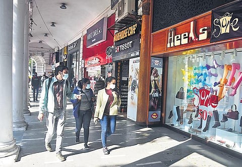 After cinemas reopened on Friday; people stroll at Connaught Place after the odd-even restrictions were lifted (Photo| EPSParveen Negi)