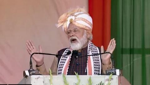 PM Narendra Modi speaking at a public rally in Impahal on Tuesday. (Photo | Twitter)