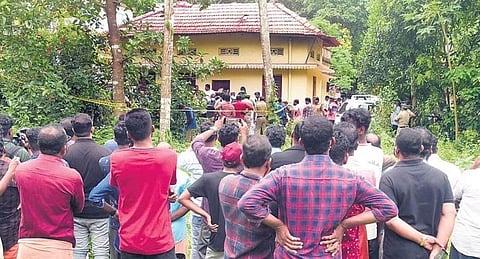 People gathered near the house of Bhagaval Singh at Elanthoor in Pathanamthitta after the news of the human sacrifice came to light on Tuesday. (Photo | Shaji Vettipuram, EPS)