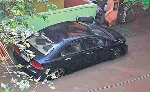 Heavy rain on Thursday night submerge a car in Bengaluru | Express