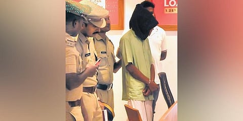Mohammed Shafi being taken for evidence collection to a jewellery shop in Kochi on Monday | Express