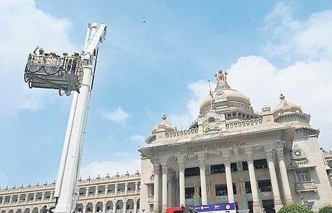 Chief Minister Basavaraj Bommai and other dignitaries atop the 90-m aerial ladder after its inauguration at Vidhana Soudha in Benglauru on Thursday | nagaraja gadekal