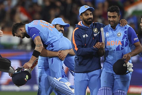 India's Virat Kohli is carried by a teammate after winning their T20 World Cup cricket match against Pakistan in Melbourne. (Photo | AP)