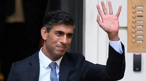 British politician Rishi Sunak waving outside the party's headquarters in London, Britain. (Photo | AFP)