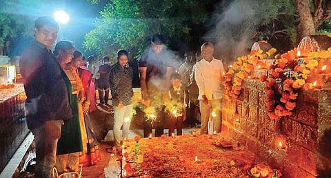People celebrate Diwali at a graveyard in Karimnagar on Monday night