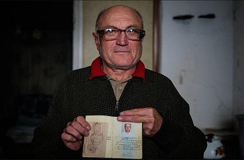 Ukrainian pensioner Volodymyr Zelensky says he doesn't look like his nation's President. (Photo|AFP)