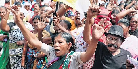 The coastal community protests against the Vizhinjam seaport project at Mulloor in Thiruvananthapuram on Thursday.