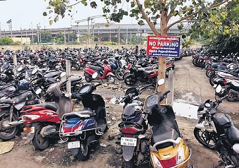 Two-wheelers parked in the parking space near the western entrance at the Tambaram railway station. (Photo | Ashwin Prasath, EPS)
