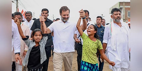 Congress leader Rahul Gandhi with young supporters during the party's 'Bharat Jodo Yatra', in Ballari district. (File Photo | PTI)