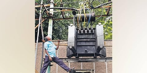 An EB worker repairs a transformer at Vepery in Chennai on Monday | R Satish Babu