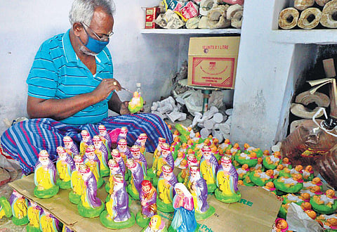 A worker adds the finishing touches to dolls. Image used for representational purpose. | KK SUNDAR